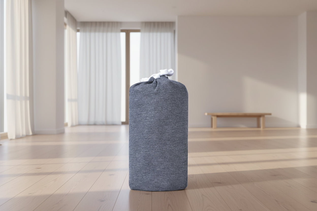 Gray drawstring bag on a white background